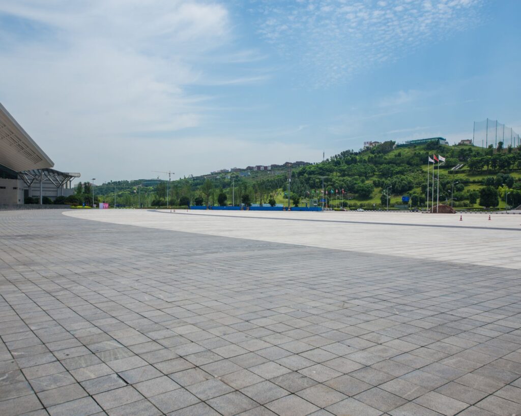 long-empty-footpath-modern-city-square-with-skyline (1)